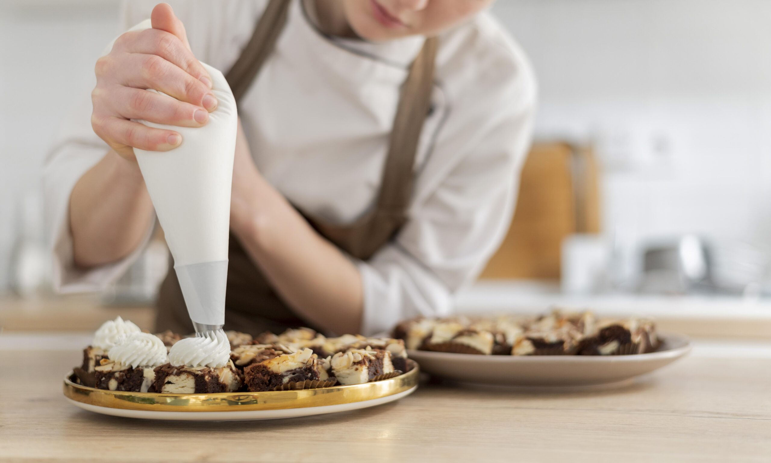 close-up-cook-preparing-dessert